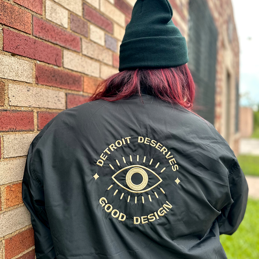 Detroit Deserves Good Design Gold Emblem Bomber Jacket